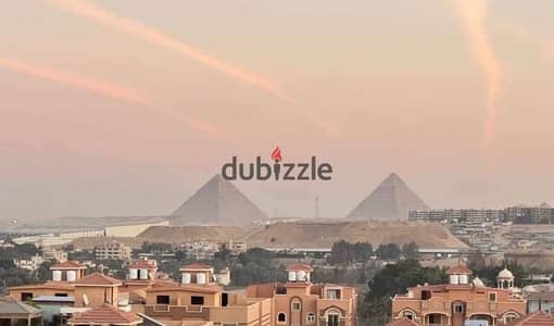 Daily Dollar Investment in Front of the Pyramids — Studio with Rooftop for Sale in a Compound Overlooking the Grand Egyptian Museum & the Pyramids wit