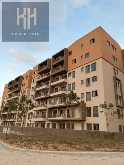apartment with a garden, 112 square meters, ready for immediate occupancy at a great price in Bloomfields Compound, next to Madinaty, Sa