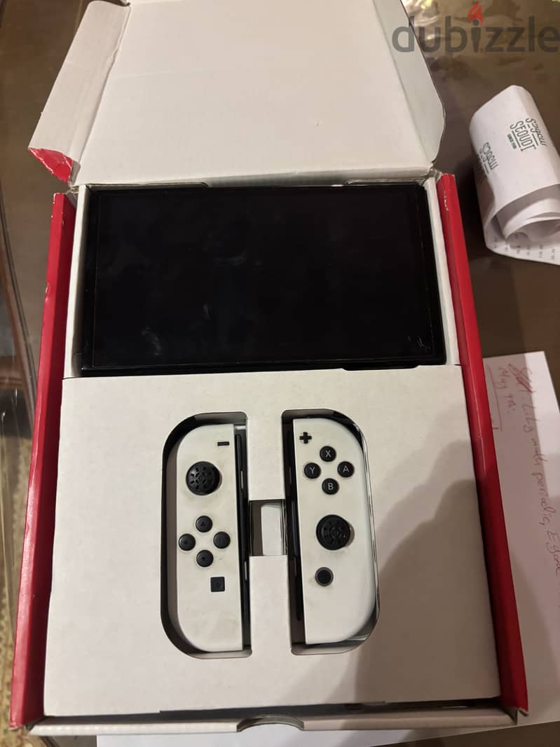 Nintendo switch oled with pro controller 5