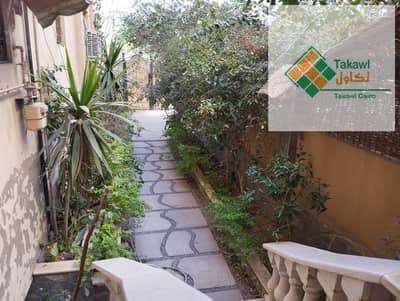 Ground Floor Apartment with Private Garden for Sale in New Cairo 230sqm Private Entrance Near Gamal Abdel Nasser Axis.