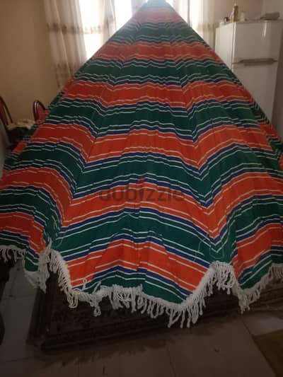 شمسيه بحر كبيره خشب زان بحاله ممتازه موجوده بمرسى مطروح 01552899905