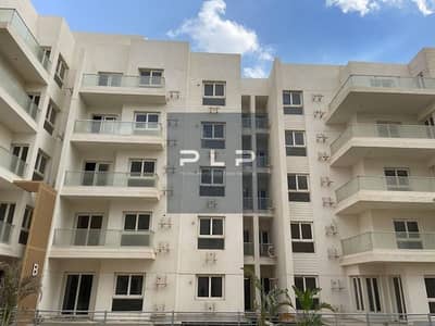 Apartment with garden for sale below market price, resale, immediate handover, ready to move in at Mountain View iCity, with a Premium view.