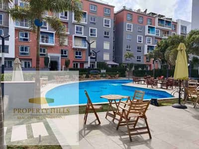 Duplex with a fully finished garden, immediate delivery, close to the American University, includes electricity, gas, and water meters, private garage, and shopping mall.
