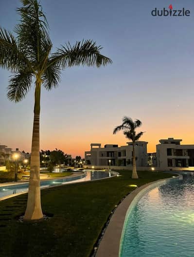 Ready-to-move-in standalone villa in Lake West Compound, located on the Dahshur Link Road, opposite the entrance to Old Sheikh Zayed City, near Arkan