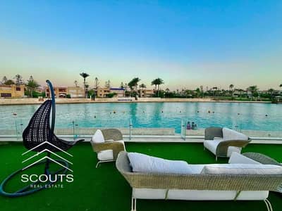باطلاله بانوراميه علي البحر واللاجون شاليه للبيع VIP متشطب بالكامل بتصميم مميز بالتكييفات والمطبخ افضل لوكيشن استراتيجي في الساحل الشمالي قرب مراسي