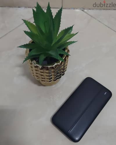 باور بنك (Power Bank) أصلي بحالة الزيرو - شحن سريع وشكل انسيابي مميز!