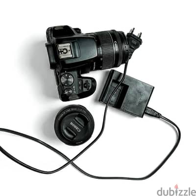 كانون 250d (استعمال خفيف جدا) + عدستين