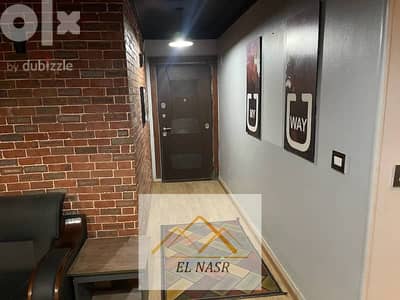 Office 100m for rent empty with office furnishings on a famous main street in Nasr City for almost free, really free with a very attractive rental price