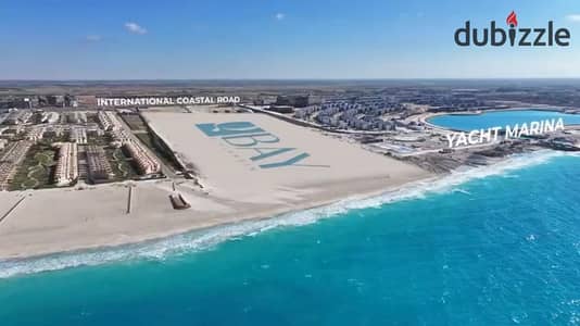 تاون هاوس للبيع 210م + جاردن + روف في Q Bay الساحل الشمالي | تشطيب فندقي وتقسيط 8 سنوات