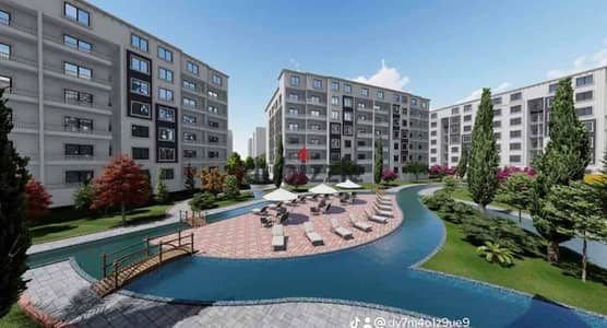 Apartment for sale, 100 sqm, in Green Town Compound. Immediate delivery at a bargain price for a quick sale. Prime location in October Gardens. "