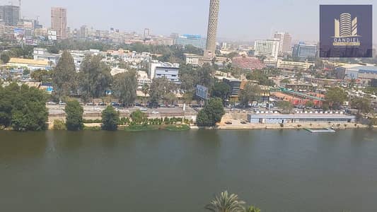 عرض VIP | شقة فاخرة بإطلالة بانورامية مباشرة على نيل الدقي للبيع شقة استثنائية داخل برج حديث إطلالة مفتوحة مباشرة على نهر النيل تشمل كورنيش العجوزة،