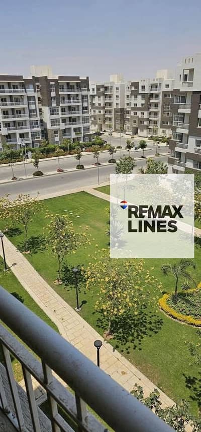 Apartment for sale in Madinaty B12 garden view on a main street with a very special location in front of the Craft Zone and the East Hub Mall, company finishing