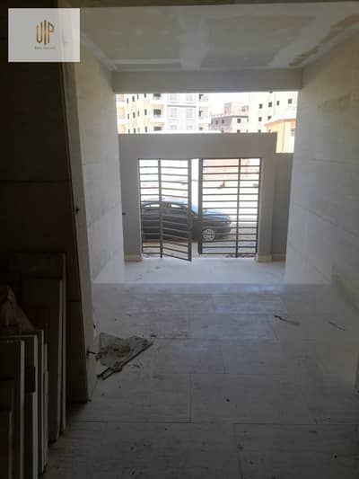 Apartment for sale in Al-Narges, Fifth Settlement, immediate delivery, 129 meters + 95 meters garden + garage unit  * overlooking a 5000 meter garden in front of the Diplomats Compound and Katameya Creeks
