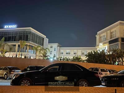 محل تجاري لقطة للبيع في الكارما 4 الشيخ زايد بجوار بيفرلي هيلز والربوة