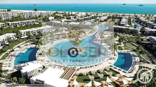 شاليه للبيع Serviced apartment في قريه D. O. S. E الساحل الشمالي متشطبه بالتكييفات دايركت علي البحر