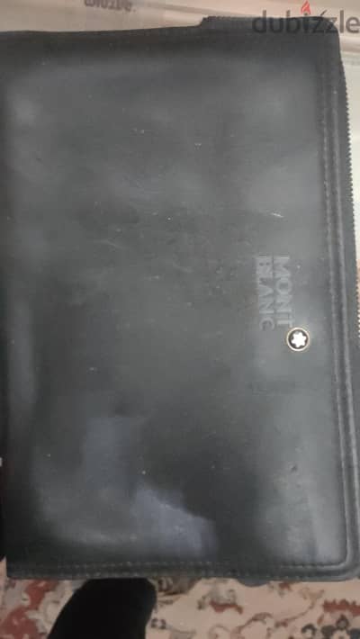 Montblanc. black leather clutch bag