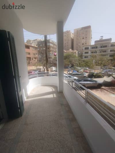 Apartment for rent in a prime location on Al-Horya Street, El-Ma'za, with high Belgian ceilings at an unbeatable price.