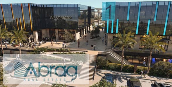 Ground floor commercial shop directly on the 26th of July Axis in Sheikh Zayed Westmark Mall 10% down payment the rest in installments