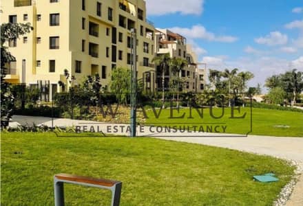 Corner Ground Apartment with Huge Private Garden for Sale with Open View Overlooking Landscape in O West By Orascom - 5% Downpayment