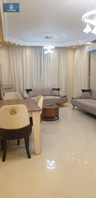 A furnished apartment is available in Al Rehab, ultra super deluxe, with an area of 119 square meters, directly in front of the Eastern Market.
