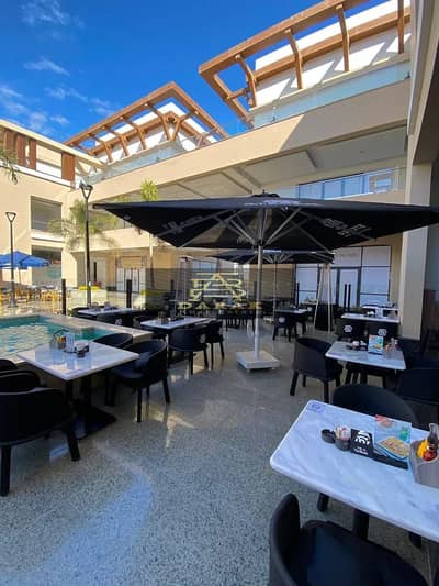 مطعم وكافيه للبيع بمدينتي في All Seasons Park مؤجر لبراند Restaurant & Cafe لوكيشن مميز على البحيرات
