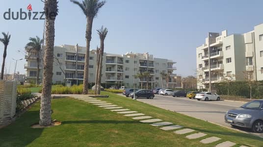 للايجار شقة ارضي بجاردن 134 متر + حديقة 114 متر كمبوند ذا ادريس , اول سكن بوحدات المطبخ و التكييفات