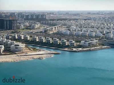 Ground floor apartment for sale with garden, double view of lagoon and sea, fully finished, immediate delivery, in New Alamein, North Coast