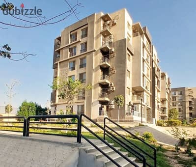 For sale, an apartment in the Dar Misr compound in Andalus, New Cairo Zone 1, directly on the Southern 90th, and in front of Hyde Park, and just minutes from the American University with a view of a wide garden.