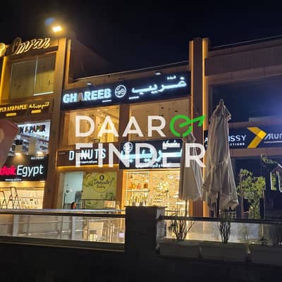 محل 50م للإيجار | موقع مميز في هيلز مول عند مدخل بالم هيلز مباشرة