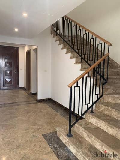 Lowest price for rent twin house in Uptown Cairo with kitchen and air conditioning, Prime Location