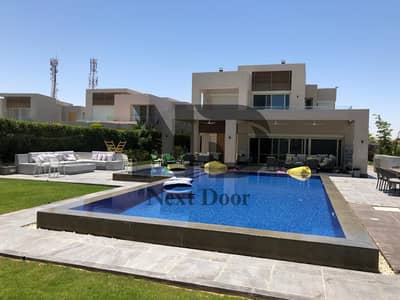 فيلا مستقلة فاخرة للبيع في Hacienda Bay بالساحل الشمالي، تتميز بتشطيب كامل وحمام سباحة خاص