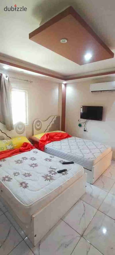 Studio Double for Rent in the Second District near Tawheed and Nour with a Balcony on the Second Floor, Elevator Included, Utilities and Electricity Included, Card Available, All Services Available, Internet Available