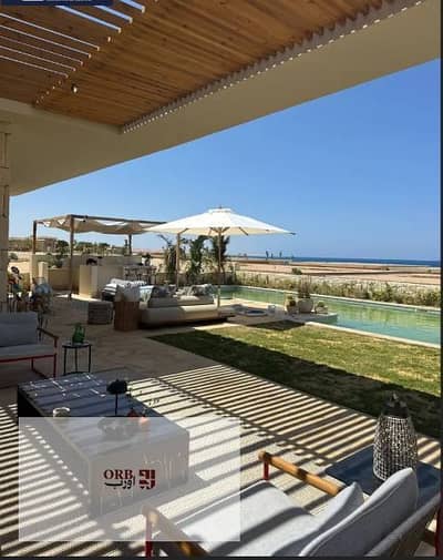 شاليه غرفتين للبيع في ازها رأس الحكمة الساحل الشمالي Azha North Coast قريب من فوكا باي وطريق الضبعة 165م فيو لاجون متشطب بالمطبخ والتكييفات بالتقسيط