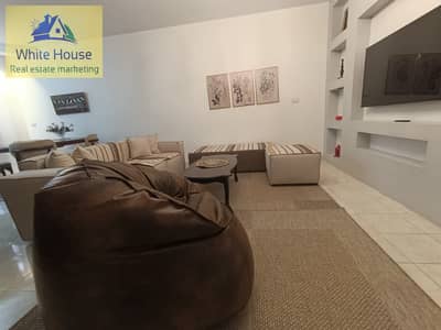 120 sqm apartment with a private garden for rent, furnished, in Rehab City, first UESD