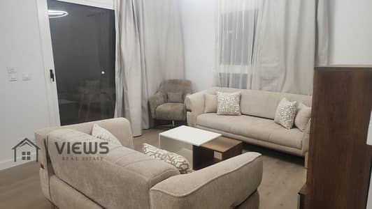 شقة 200م + 80م حديقة للايجار بالفرش تطل علي حمام سباحة ميفيدا بوليفارد Mivida Boulevard
