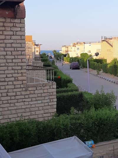 Villa for sale in Ain Sokhna, area of ​​180 sqm, garden of 80 sqm, Ultra Super Lux, with furniture and appliances