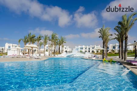 Chalet for sale in one of the most luxurious and prestigious resorts on the North Coast, AKAM Al Rajhi — 65 sqm, 1 bedroom, with only a 10% d p