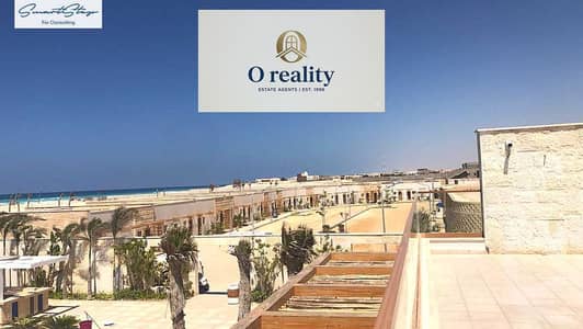 شاليه غرفتين من اعلي نقطة متشطب بالكامل على البحر مباشرة و بالتقسيط في سي شور راس الحكمة seashore Ras Al Hekma الساحل الشمالي بجوار فوكا باي