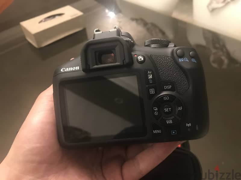 ‏Canon EOS 2000D 1