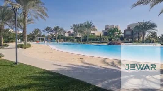 شاليه أرضي بجاردن للإيجار في مراسي مارينا 2 | غرفتين | لاجون وبول فيو | فرش فاخر باطلاله علي اللاجون و حمام السباحه و الممشي باروع فيو مكيف بالكامل