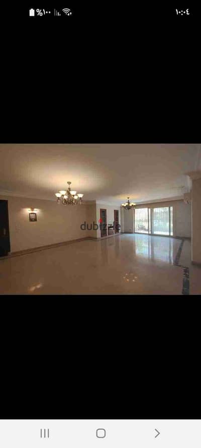 Apartment for rent 200 square meters with a 100 square meter garden, kitchen, air conditioning, chandeliers, and natural gas in the Green3 compound next to Americana Plaza