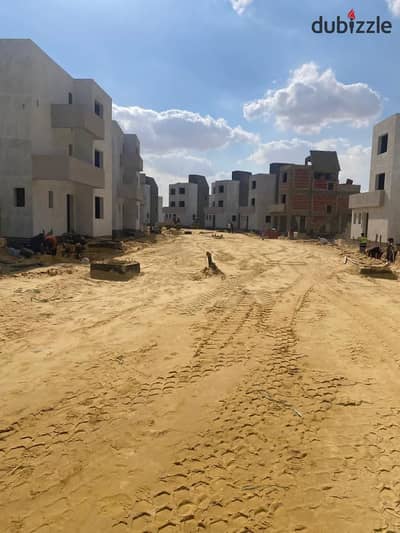 apartment with a garden in Rivers Compound, with a 600,000 down payment in New Zayed, available on the longest repayment plan — directly on El Dabaa