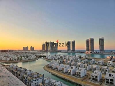 شالية للبيع غرفتين على دبل لاجون و بحر فى العلمين الجديدة الساحل الشمالى دقائق من ابراج العلمين  ( مزارين )