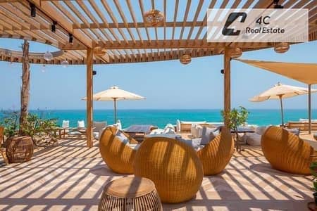 بسعر العقد القديم  شاليه  فوري ريسيل  سي شور – الساحل الشمالي-open view landscape-تقسيمه مميزة-جاهز للمعاينه و الاستلام