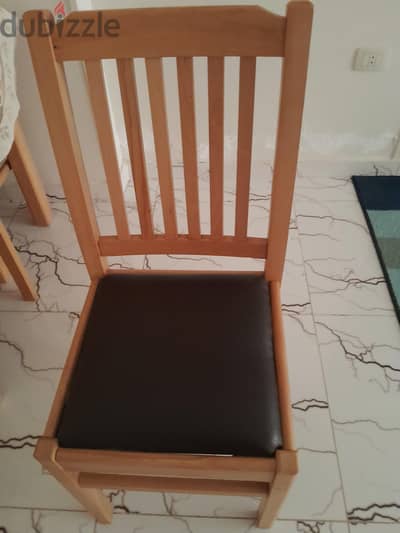 dinning table with 6 leather seats