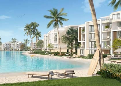 شاليه 2 غرفة نوم صف أول على اللاجون تشطيب كامل مع تكييفات ومطبخ بمقدم 5% وتقسيط حتى 10 سنوات