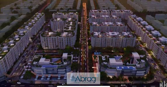 Two-bedroom ground floor apartment for sale in Rovan Views Compound, Al Thawra Al Khadra, Sheikh Zayed, with a 9-year payment plan.