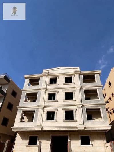 Apartment for sale, ground floor with double face in Al-Nargis with a 50% down payment near the Katameya Creeks compound near the German University.