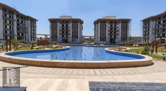 شقة لقطة متشطبة بالتكيفات امام الجامعة الامريكية مباشرة فى التجمع الخامس بالتقسيط