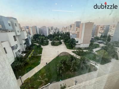Own a 220 sqm apartment in Madinaty with a special wide garden view in a very quiet location